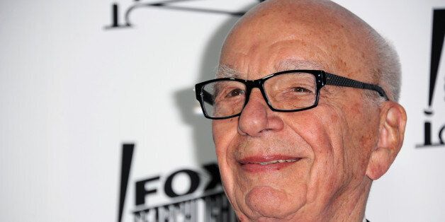 Rupert Murdoch arrives at the Twentieth Century Fox & Fox Searchlight Pictures Oscar Party at the LURE on Sunday, Feb. 24, 2013 in Los Angeles. (Photo by Richard Shotwell/Invision/AP)