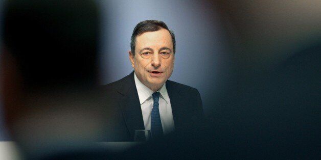 Mario Draghi, President of the European Central Bank, ECB addresses the media during a press conference following the meeting of the Governing Council in Frankfurt am Main, western Germany, on January 22, 2015. The European Central Bank will purchase 60 bn euros of bonds per month until end September 2016, Draghi announced. AFP PHOTO / DANIEL ROLAND (Photo credit should read DANIEL ROLAND/AFP/Getty Images)