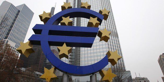 A sculpture featuring the EURO logo is pictured in front of the European Central Bank (ECB) in Frankfurt am Main, western Germany, December 2, 2014. The giant Euro logo will stay in downtown Frankfurt am Main despite the ECB headquarters moves to the city's eastern district of Ostend, its owner announced on December 1, 2014. AFP PHOTO / DANIEL ROLAND (Photo credit should read DANIEL ROLAND/AFP/Getty Images)