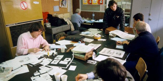 PARIS, FRANCE - JANUARY 19: French cartoonist Cabu at the editorial board of the newspaper 'Le Canard enchaÃ®nÃ©' in Paris, France, on January 19, 1988. (Photo by Frederic REGLAIN/Gamma-Rapho via Getty Images)