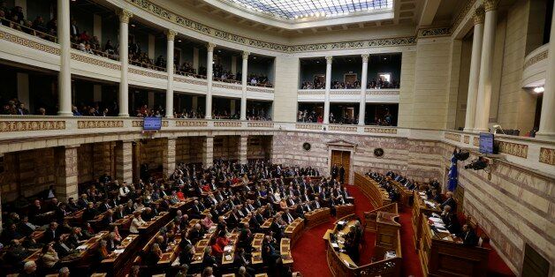 Greek lawmakers attend the third round of voting to elect a new Greek president at the Parliament in...