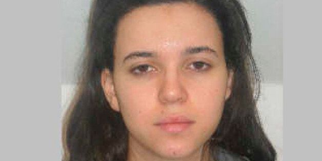 FILE - This photo provided by the Paris Police Prefecture Friday, Jan. 9, 2015 shows Hayat Boumedienne the suspect in the kosher market attack. Turkey's foreign minister said Monday Jan.12, 2015 that Boumedienne, wife of Amedy Coulibaly, one of the perpetrators of the terrorist rampage in France last week, crossed into Syria from Turkey on Jan. 8. (AP Photo/Prefecture de Police de Paris, File)