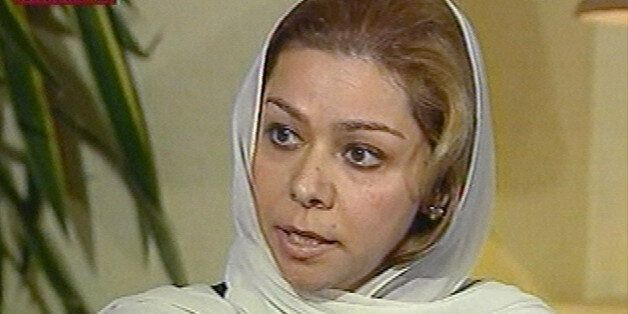 Raghad Saddam Hussein, a daughter of the former Iraqi President Saddam Hussein, is interviewed on the Al Arabiya satellite television channel, Aug. 1 2003, in Amman, Jordan. Raghad said in an interview published Tuesday Aug. 3, 2004 that as the eldest living child of the former Iraqi leader she must become a politician, because her father and many Iraqis were depending on her. (AP Photo/Al Arabiya)