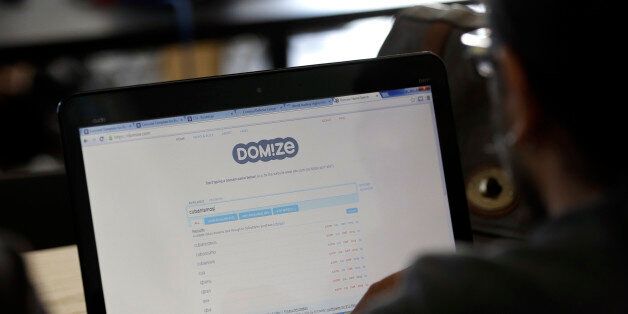 A participant does a search for a domain name during a
