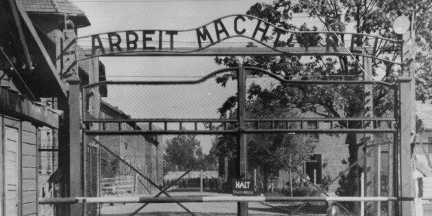 Undated file photo shows the main gate of the Nazi concentration camp Auschwitz, in Poland, which was liberated by the Russians, in January 1945. Writing over the gate reads: