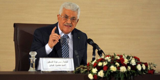 Palestinian President Mahmoud Abbas, delivers a press conference during a visit to the Algerian Foreign Affairs Ministry in Algiers, Tuesday, Dec. 23, 2014. Abbas is in Algeria for a three-day state visit. ( AP Photo/Sidali Djarboub)