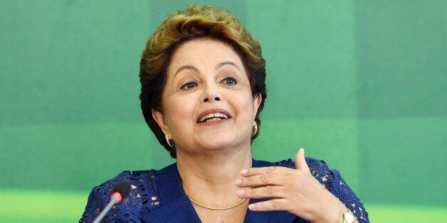Brazilian President Dilma Rousseff attends a breakfast with journalists at Planalto Palace in Brasilia, on December 22, 2014. Rousseff spoke about the achievements of her government in 2014 and the corruption scandal in the state oil company Petrobras. AFP PHOTO/EVARISTO SA (Photo credit should read EVARISTO SA/AFP/Getty Images)