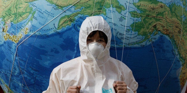 SEOUL, SOUTH KOREA - MARCH 10: A South Korean environmentalist participates in a rally held to commemorate the Fukushima nuclear disaster on the eve of the one year anniversary of Japan's earthquake and tsunami on March 10, 2012 in Seoul, South Korea. Currently four nuclear power plants are in operation in South Korea while the government plans to increase the number of reactors to 32 by the year 2021. (Photo by Chung Sung-Jun/Getty Images)