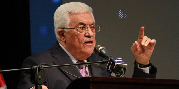 RAMALLAH, WEST BANK - JANUARY 04: Palestinian President Mahmoud Abbas speaks during the opening ceremony of the 'Jerusalem in Memory' exhibition in the West Bank city of Ramallah, on January 04, 2015. (Photo by Issam Rimawi/Anadolu Agency/Getty Images)