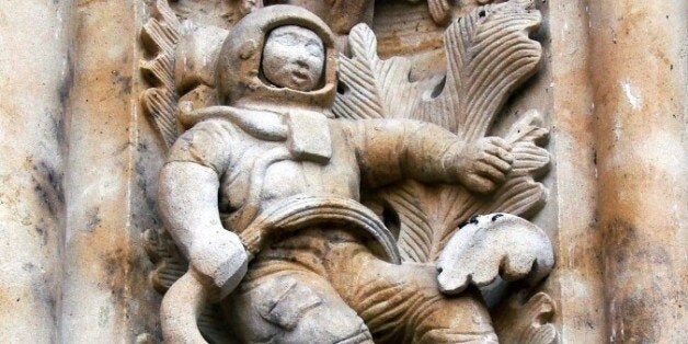 Perched on a faÃ§ade over the northern entrance of a 300-year-old cathedral in Salamanca, Spain, is a carved figure remarkably reminiscent of a modern astronaut. Construction of the cathedral was started in 1513 and completed in 1733.