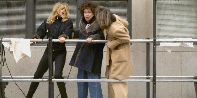 UNITED STATES - JANUARY 16: Goldie Hawn, Bette Midler and Diane Keaton (l. to r.) hang onto a building scaffold as they film the movie 'First Wives Club' at Fifth Ave. and 87th St., (Photo by Richard Corkery/NY Daily News Archive via Getty Images)