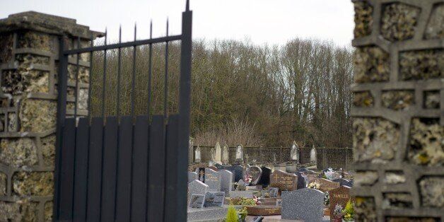 A picture taken on January 04, 2015 shows the cemetery of Champlan, a southern Paris' suburb. Champlan's mayor has been accused of racism following his refusal to allow a Roma baby to be buried in the municipal cemetery. He explained his refusal on the grounds that the cemetery has 'few available plots.' AFP PHOTO / KENZO TRIBOUILLARD (Photo credit should read KENZO TRIBOUILLARD/AFP/Getty Images)
