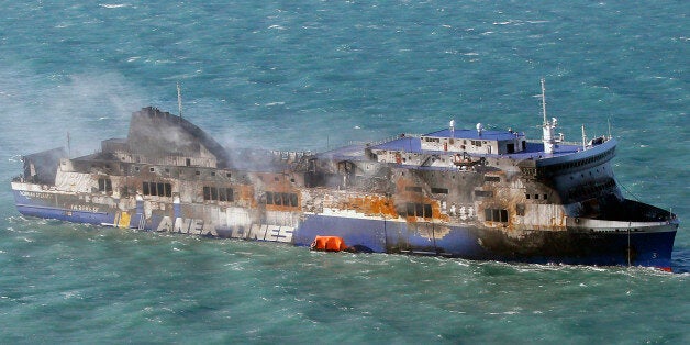 Smoke billows from the Italian-flagged Norman Atlantic ferry that caught fire in the Adriatic Sea, Tuesday, Dec. 30, 2014. A blaze broke out on the car deck of the Norman Atlantic Sunday, Dec. 28, while the ferry was traveling from the Greek port of Patras to Ancona in Italy causing the death of at least 11 people. Italian and Greek helicopter rescue crews evacuated 427 people among passengers and crew members but Italian officials think the death toll could be much higher because of serious dis