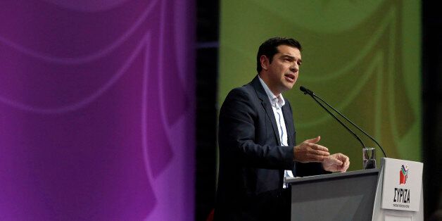 Alexis Tsipras, leader of the Syriza party, speaks to his supporters at a pre-election party congress in Athens, Greece, on Saturday, Jan. 3, 2015. Greece's political parties embarked on a flash campaign for elections in less than three weeks that Prime Minister Antonis Samaras said will determine the fate of the countrys membership in the euro currency area. Photographer: Kostas Tsironis/Bloomberg via Getty Images
