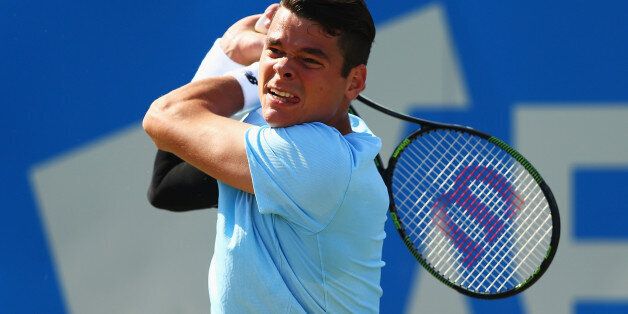 LONDON, ENGLAND - JUNE 19: Milos Raonic of Canada plays a backhand in his men's singles quarter-final match against Gilles Simon of France during day five of the Aegon Championships at Queen's Club on June 19, 2015 in London, England. (Photo by Clive Brunskill/Getty Images)
