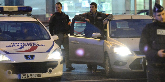 PARIS, FRANCE - JANUARY 09: Police guard a street during a hostage situation at Port de Vincennes on January 9, 2015 in Paris, France. According to reports at least five people have been taken hostage in a kosher deli in the Port de Vincennes area of Paris. A huge manhunt for the two suspected gunmen in Wednesday's deadly attack on Charlie Hebdo magazine has entered its third day. (Photo by Aurelien Meunier/Getty Images)