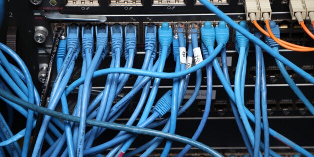 NEW YORK, NY - NOVEMBER 10: Network cables are plugged in a server room on November 10, 2014 in New York City. U.S. President Barack Obama called on the Federal Communications Commission to implement a strict policy of net neutrality and to oppose content providers in restricting bandwidth to customers. (Photo by Michael Bocchieri/Getty Images)