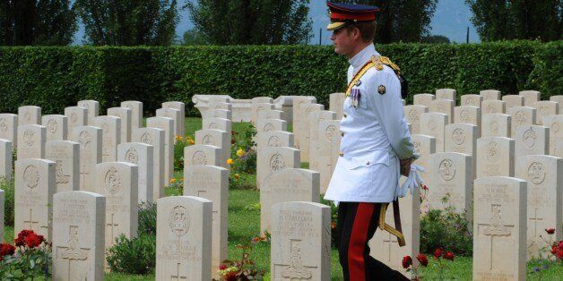 Prince Harry of Great Britain visits the British War Cemetery of Cassino on May 19, 2014 as part of the ceremonies marking the 70th anniversary of a key World War II battle in which tens of thousands died. The battle in and around the town of Cassino, some 140 kilometres (90 miles) southeast of Rome, eventually led to the liberation of the Italian capital. The 'battle' actually consisted of four major assaults by Allied troops on German lines over a period of four months starting in February 194