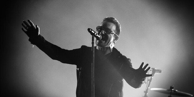 GLASGOW, SCOTLAND - NOVEMBER 09: (EDITORS NOTE: Image has been converted to black and white) An alternative view of Bono of U2 during the MTV EMA's at The Hydro on November 9, 2014 in Glasgow, Scotland. (Photo by Gareth Cattermole/MTV 2014/Getty Images for MTV)