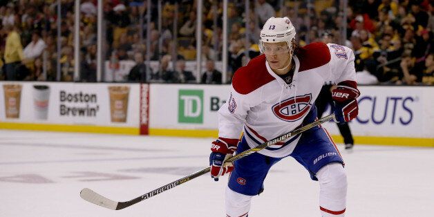 Montreal Canadiens right wing Alexander Semin (13) looks for the puck during the third period of an NHL hockey game in Boston, Saturday, Oct. 10, 2015. (AP Photo/Mary Schwalm)