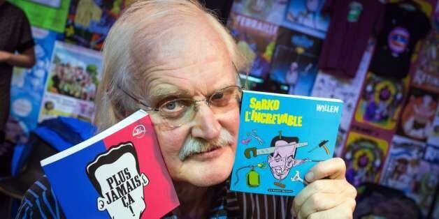 RESTRICTED TO EDITORIAL USE, MANDATORY MENTION OF THE ARTIST UPON PUBLICATION, TO ILLUSTRATE THE EVENT AS SPECIFIED IN THE CAPTIONPresident of the 41st edition of the 'Festival international de la bande dessinee' (International Comic Book Festival), Dutch comic book author Bernard Willem Holtrop, aka Willem, poses with two of his books during the festival in Angouleme, central France, on January 31, 2014. Willem won the Grand Prize of the City of Angouleme during the festival's 40th edition in 2