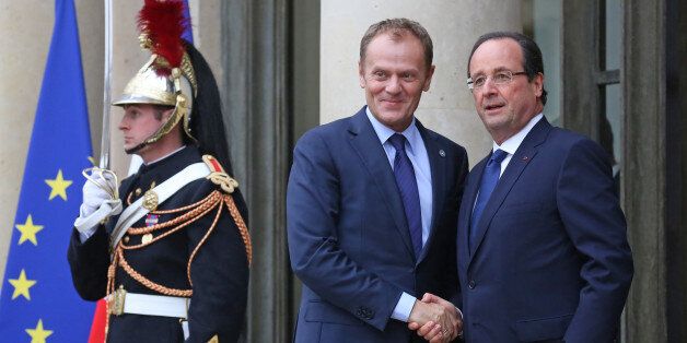 French President Francois Hollande, right, greets Poland's prime minister Donald Tusk, prior to their meeting at the Elysee Palace in Paris, Tuesday Nov. 12, 2013. European leaders are meeting Tuesday in Paris to talk about youth unemployment. They are tackling the subject for at least the fourth time in six months, but the jobless rate has only continued a slow rise.(AP Photo/Remy de la Mauviniere)