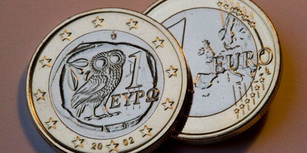 GERMANY, BONN - JANUARY 06:Â Front and back of a Greek 1 Euro coin, on January 06, 2015 in Bonn, Germany. (Photo by Ulrich Baumgarten via Getty Images)