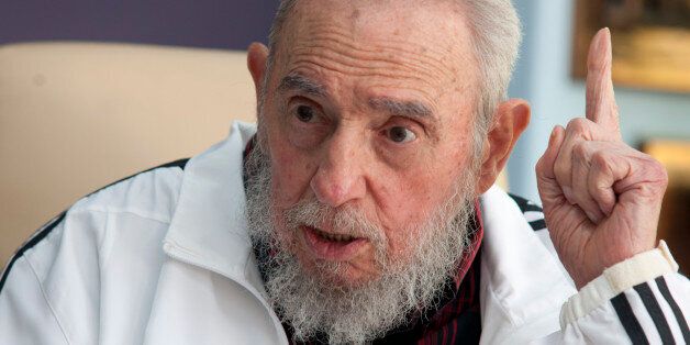 FILE - In this July 11, 2014 file photo, Cuba's Fidel Castro speaks with Russia's President Vladimir Putin in Havana, Cuba. In a statement published Friday, July 18, 2014 by state media, Castro is blaming the Ukrainian government in Kiev for the downing of a Malaysian Airlines passenger plane. Castro's comments came one week after he welcomed Vladimir Putin during the Russian leader's tour of Latin America. (AP Photo/Alex Castro, File)