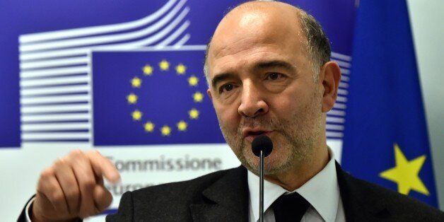 European economic and financial affairs, taxation and customs commissioner Pierre Moscovici speaks to the press in Rome on December 12, 2014. AFP PHOTO / GABRIEL BOUYS (Photo credit should read GABRIEL BOUYS/AFP/Getty Images)