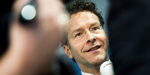 Eurogroup President and Dutch Finance Minister Jeroen Dijsselbloem reacts on the results of the comprehensive stress tests of European banks published by the ECB and the European European Banking Authority (EBA) at the Dutch Ministry of Finance in The Hague, The Netherlands, on October 26, 2014. According to Dijsselbloem the banks have anticipated, the past period, to already pick up additional capital. AFP PHOTO/ANP KOEN VAN WEEL netherlands out (Photo credit should read Koen van Weel/A
