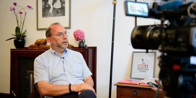 Professor Peter Piot, the Director of the London School of Hygiene and Tropical Medicine, speaks during an interview at his office in central London, England, on July 30, 2014. Professor Piot was one of the co-discoverers of the Ebola virus during its first outbreak in Zaire, in 1976. AFP PHOTO/Leon NEAL (Photo credit should read LEON NEAL/AFP/Getty Images)