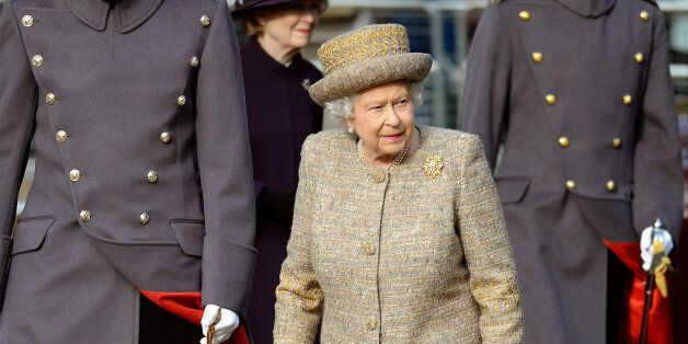 Britain's Queen Elizabeth arrives for the opening of the Flanders' Fields Memorial at Wellington Barracks in London, Thursday Nov. 6, 2014. The Flandersâ Fields Memorial Garden has been created with soil taken from the 70 battlefields and Commonwealth War Grave Cemeteries in Flanders. (AP Photo/John Stillwell, Pool)