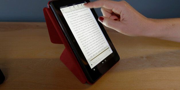 The 7-inch Amazon Kindle HDX, is shown on the optional folding