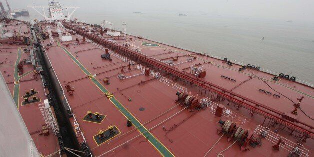 GUANGZHOU, CHINA - NOVEMBER 04: (CHINA OUT) China's largest crude oil tanker 'Kai Gui' with load capacity of 200,000 tons starts its maiden voyage on November 4, 2014 in Guangzhou, Guangdong province of China. China's largest crude oil tanker 'Kai Gui' with total height of over 70 meters is seven times larger than Chinese aircraft carrier 'Liaoning'. (Photo by ChinaFotoPress/ChinaFotoPress via Getty Images)