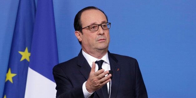French President Francois Hollande addresses the media at the end of an EU summit at the European Council building in Brussels, Thursday, Dec. 18, 2014. European Union leaders agreed Thursday to create a strategic investment fund that could generate up to 315 billion euros ($386 billion) in private- and public-sector money to upgrade infrastructure, jumpstart the EUâs sluggish economies and ignite job growth. (AP Photo/Yves Logghe)
