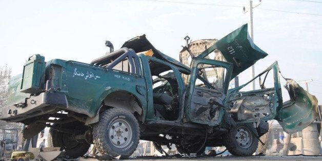 NANGARHAR, AFGHANISTAN - DECEMBER 17: At least two police died and 6 others injured in two different bombing attacks on police vehicles in Nangarhar, Afghanistan on December 17, 2014. (Photo by Ziar Khan Yaad/Anadolu Agency/Getty Images)