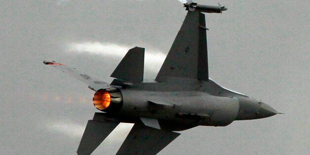 A Lockheed Martin F16 Fighting Falcon performs its demonstration flight, on the first day of the Paris air show, at Le Bourget airport, Monday June 20, 2011.(AP Photo/Francois Mori)