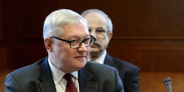 Russian Deputy Foreign Minister Sergei Ryabkov looks on at the start of the two days of closed-door nuclear talks on Tuesday, Oct. 15, 2013 at the United Nations offices in Geneva, Switzerland. Iran's overtures to the West are being tested as the U.S. and its partners sit down for the first talks on Tehran's nuclear program since the election of a reformist Iranian president. Negotiations between Iran and the U.S., Russia, China, Britain, France and Germany began Tuesday morning. (AP Photo/Fabrice Coffrini, pool)