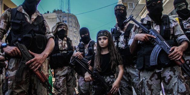 Children taking part in the military parade, which was organized by Al-Quds Brigades, the armed wing of Islamic Jihad, marking the end of the war on Gaza and what they called a victory over Israel. Gaza, Palestine, on August 29, 2014. Photo by Ibrahim Khader/Pacific Press/ABACAPRESS.COM