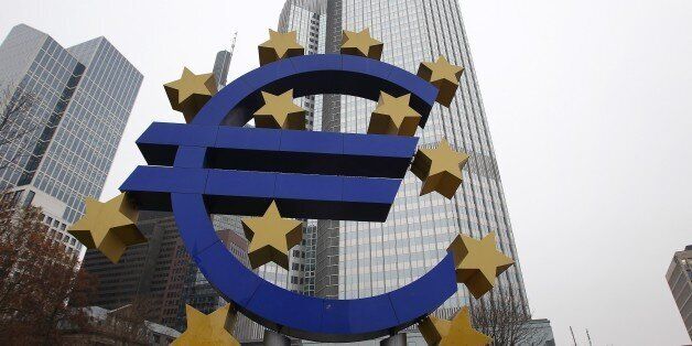 A sculpture featuring the EURO logo is pictured in front of the European Central Bank (ECB) in Frankfurt am Main, western Germany, December 2, 2014. The giant Euro logo will stay in downtown Frankfurt am Main despite the ECB headquarters moves to the city's eastern district of Ostend, its owner announced on December 1, 2014. AFP PHOTO / DANIEL ROLAND (Photo credit should read DANIEL ROLAND/AFP/Getty Images)