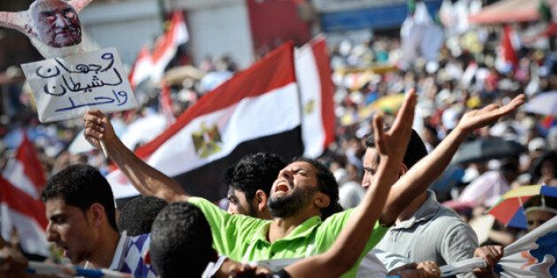 On June 24 tens of thousands of Muslim Brotherhood supporters gathered in Tahrir Square to celebrate the victory of their candidate Mohamed Morsi, who was announced Egypt's president by the electoral commission around 5pm.