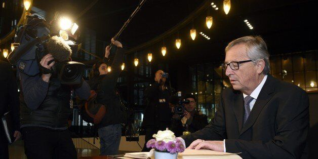 EU Commission president Jean Claude Juncker signs a guest book before his solemn undertaking on December 10, 2014 at the Court of Justice of the European Union in Luxembourg. AFP PHOTO / JOHN THYS (Photo credit should read JOHN THYS/AFP/Getty Images)