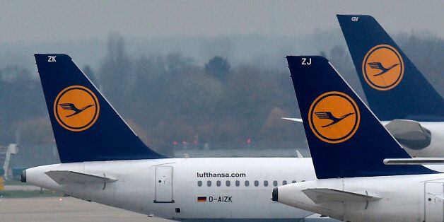 Lufthansa planes park at the airport in Duesseldorf, Germany, during a strike of Lufthansa pilots on Monday, Dec. 1, 2014. German airline Lufthansa says it has cancelled about half of its flights after pilots went on strike in an ongoing dispute over retirement benefits. The airline, Germany's largest, said Monday that 1,350 of its 2,800 flights scheduled through the strike's end Tuesday at midnight have been cancelled, affecting 150,000 passengers. The strike was primarily focused on Lufthansa's inner-Europe flights on Monday but was to be extended to long-haul flights Tuesday. (AP Photo/Martin Meissner)