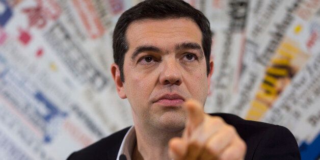 Greek leftwing opposition leader Alexis Tsipras answers to a question during a press conference at the Foreign Press Club in Rome, Friday, Feb. 7, 2014. (AP Photo/Domenico Stinellis)