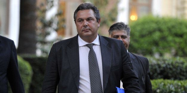 Leader of the 'Independent Greeks', Panos Kammenos leaves the presidental palace after a meeting with Greek President Carolos Papoulias in Athens on May 13, 2012. Emergency Greek cabinet talks yielded no clear progress on May 13, raising the prospect of new elections that could scupper reforms and drive the country out of the eurozone. AFP PHOTO / LOUISA GOULIAMAKI (Photo credit should read LOUISA GOULIAMAKI/AFP/GettyImages)