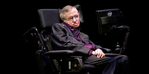 Physicist and best-selling author Stephen Hawking appears in Seattle, Saturday, June 16, 2012. Hawking was taking part in the Seattle Science Festival Luminaries Series. (AP Photo/Ted S. Warren)