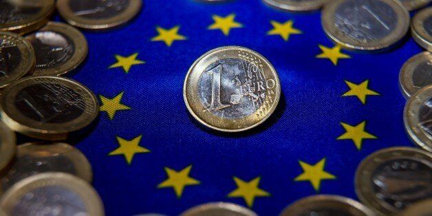 A picture shows one-euro coins in Lille on August 25, 2014. AFP PHOTO/PHILIPPE HUGUEN (Photo credit should read PHILIPPE HUGUEN/AFP/Getty Images)