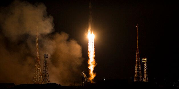 The Soyuz-FG rocket booster with Soyuz TMA-15M space ship carrying a new crew to the International Space Station, ISS, blasts off at the Russian leased Baikonur cosmodrome, Kazakhstan, Monday, Nov. 24, 2014. The Russian rocket carries U.S. astronaut Terry Virts, Russian cosmonaut Anton Shkaplerov and Italian astronaut Samantha Cristoforetti. (AP Photo/NASA, Aubrey Gemignani)