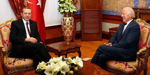 In this photo provided by the Presidential Press Service, Turkey's President Recep Tayyip Erdogan, left, and U.S. Vice President Joe Biden speak during a meeting in Istanbul, Turkey, Saturday, Nov. 22, 2014. Biden on Friday became the latest in a parade of U.S. officials trying to push Turkey to step up its role in the international coalition's fight against Islamic State extremists.(AP Photo/Kayhan Ozer, Turkish Presidential Press Service, HO)