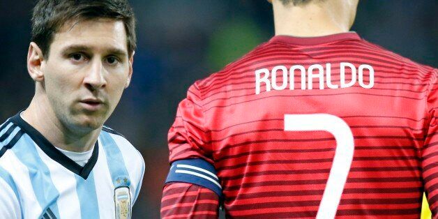Lionel Messi of Argentina, left, stands next to Cristiano Ronaldo of Portugal before their International Friendly soccer match at Old Trafford Stadium, Manchester, England, Tuesday Nov. 18, 2014. (AP Photo/Jon Super)